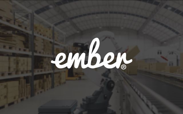 The Ember logo on a grey background picture displaying a robot at work in a factory