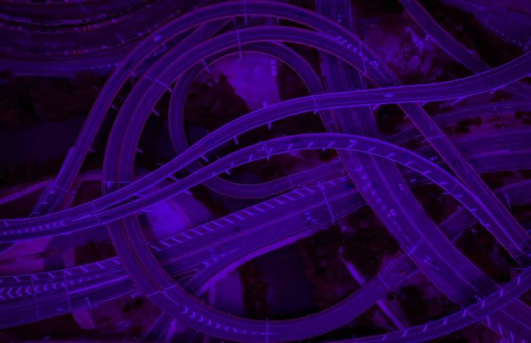 Aerial view of a multilayer highway interchange.